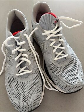 New Balance Men’s Light Grey Athletic Running Sneakers with Red Tongue Accent